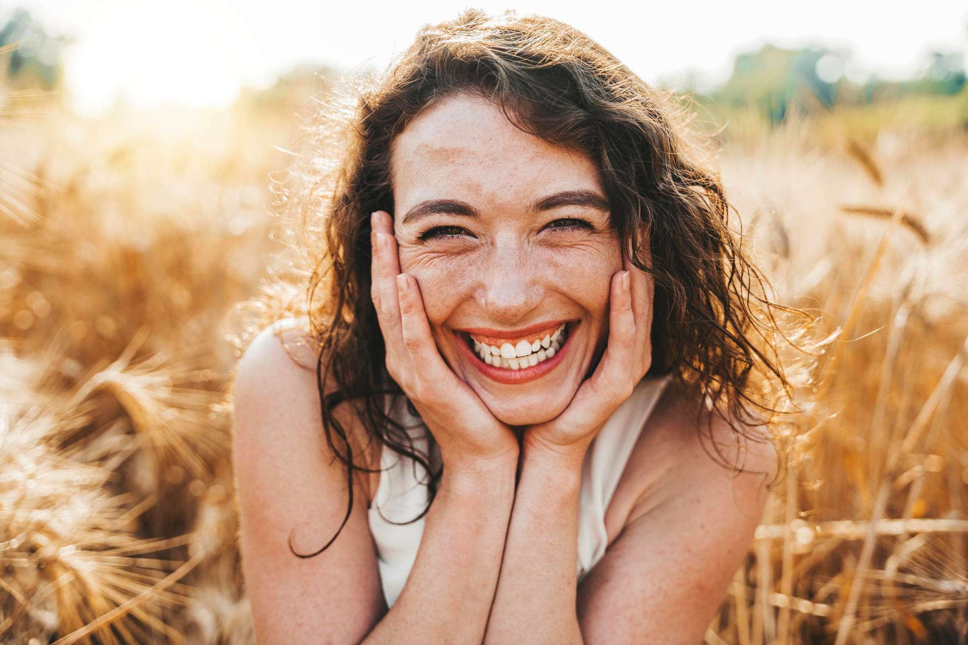 happy-beautiful-woman-smiling-at-camera-in-a-wheat-2025-02-10-07-55-15-utc_11zon.jpg