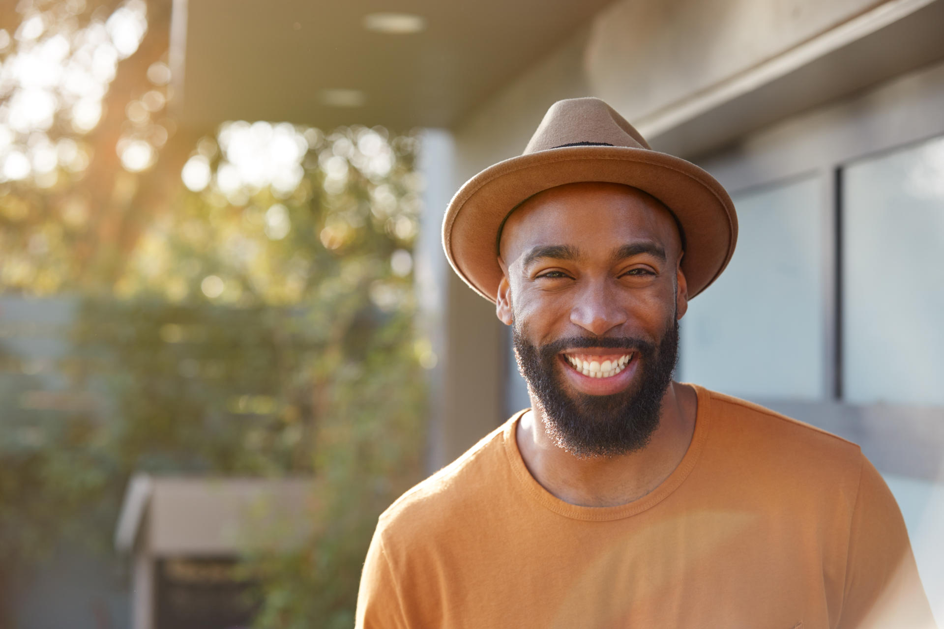 portrait-of-smiling-african-american-man-wearing-h-2024-10-21-14-59-55-utc.jpg